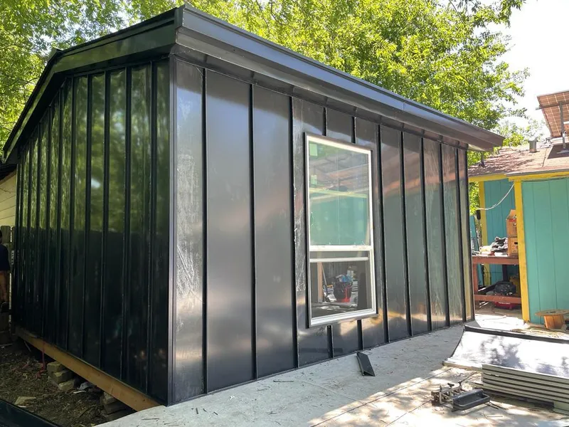 Black standing seam metal wall panels for Metal Roof Installation in Woodway